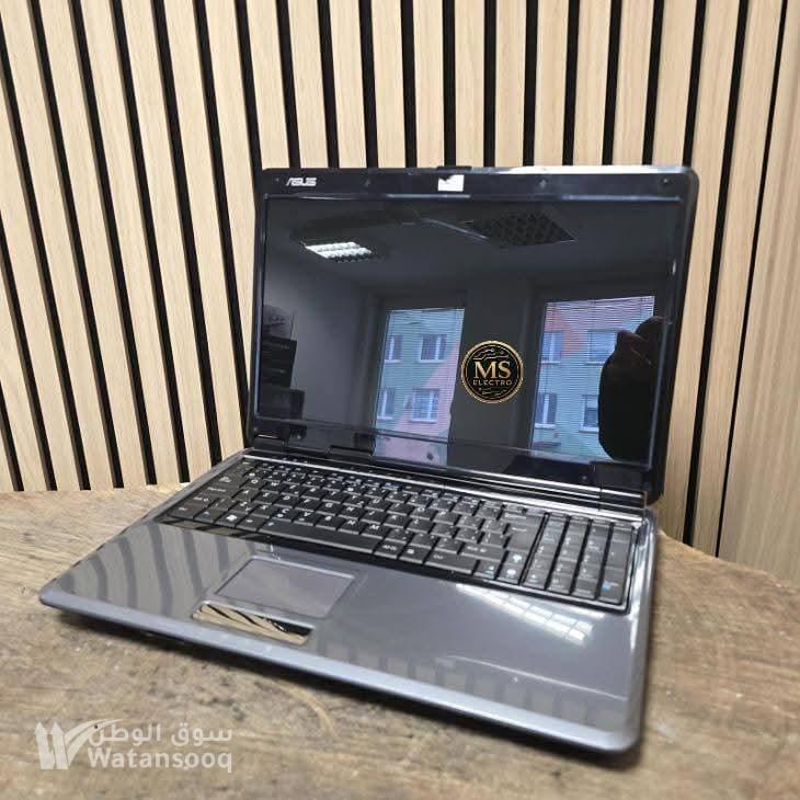 لابتوب Asus بحالة ممتازه ومكفول